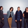 Foto de divulgação da banda Arctic Monkeys durante o ano de 2009, para o álbum Humbug